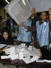 Emptying ballot boxes at the vote count near Kabul(Photo: Tony Cross)