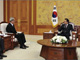 Lee Myun-Bak (R) and two North Korean envoys at the presidential Blue House in Seoul, 23 August 2009(Photo: Blue House handout via Reuters)