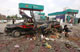 A policeman examines a vehicle at the site of an explosion in Charssada, 160 km from Pakistan's capital Islamabad, on 17 August, 2009. Six people were killed in the attack, which the Taliban claimed responsibility for. (Photo: Reuters/Ali Imam)