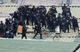 Riot policemen throw rocks toward striking workers of Ssangyong Motor running away on top of factories (Photo: Reuters)