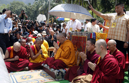 The Dalai Lama on a controversial visit to typhoon victims, 31 August 2009.(Photo: Nicky Loh/Reuters)
