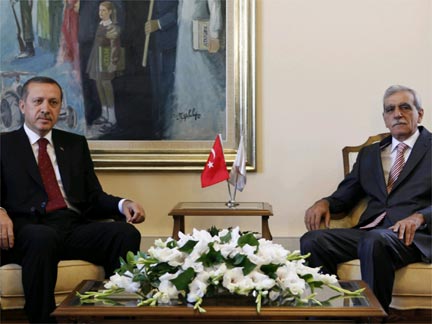 Turkey's Prime Minister Tayyip Erdogan (L) and DTP leader Ahmet Turk in Ankara (Photo: Reuters)