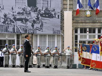France's President Nicolas Sarkozy attends a ceremony to mark the 65th anniversary of the liberation of Paris from Nazi occupation (Credit: Reuters)