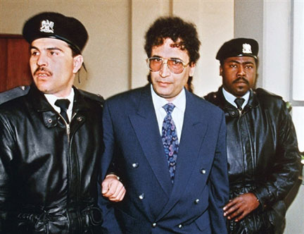 Abdel Basset Ali al-Megrahi escorted by Libyan police officers in 1992(Photo: AFP)