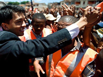 From the exhibition, Andry Rajoelina greets supporters on 13 February 2009(Photo: Walter Astrada/Agence France-Presse)