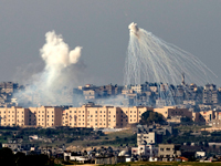 A weapons system fired by Israeli forces explodes over the Gaza Strip during the conflict(Credit: Reuters )