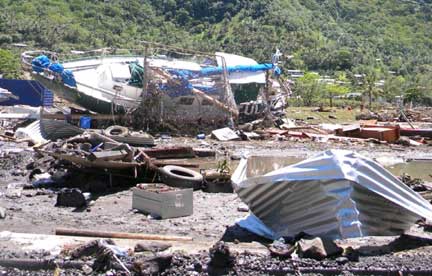 A boat is stranded among wreckage after a tsunami hit the village of Si'umu in Samoa
(Photo: Reuters/Cynthia Luafalealo)