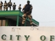 Soldiers guard the electoral commission offices in Libreville(Photo: Issouf Sanogo/AFP)
