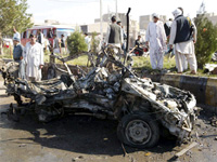 The scene of a roadside blast in Herat province Sunday
(Photo: Reuters)