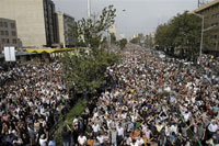 Iranian supporters of defeated presidential candidate Mir Hossein Mousavi march in Tehran on 15 June, 2009.(Photo: AFP)