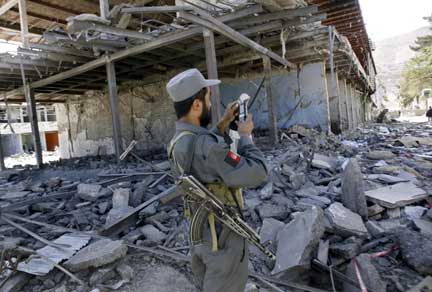 An Afghan police officer at the site of Thursday's attack on the Indian embassy in Kabul(Photo: Reuters)