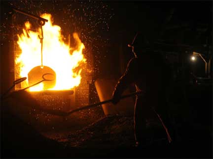 A labourer works at a foundry plant in Xinzhou, Shanxi province, China.(Photo: Reuters)