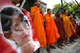 Monks from Myanmar pray next to a portrait of Aung San Suu Kyi during a rally in Thailand on 26 September, 2009(Photos: Reuters)