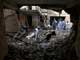 Residents in Peshawar return to collect belongings from their homes after Thursday's bomb (Photo: Reuters)
