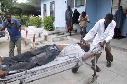 A man is stretchered to hospital after Thursday’s shelling in Mogadishu(Photo : Reuters/Omar Faruk)