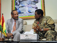  Junta leader Moussa Dadis Camara talks with UN Assistant Secretary General Haile Menkerios (l) in Conakry(Photo: Sia Kambou/AFP)