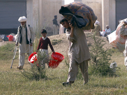 Internally displaced people (IDPs), fleeing a military offensive in South Waziristan on Monday(Photo: Reuters)