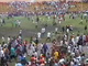 Demonstrators try to escape from the Conakry stadium on 28 September 2009(Photo: Reuters)