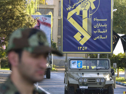A Revolutionary Guards member stands in front of the ground forces headquarters in Tehran on Tuesday(Photo: Reuters)