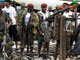 Mend members hand in their arms in Port Harcourt this month(Photo: AFP)