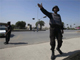 Security officials secure the gates to the army headquarters in Rawalpindi on 10 October(Photo: Reuters)