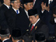 Indonesia'n President Susilo Bambang Yudhoyono is greeted by parliament members as he prepares to be sworn in(Photo: Reuters)