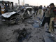 Security officials survey the site of Saturday's suicide bomb blast in Peshawar(Photo: Reuters)