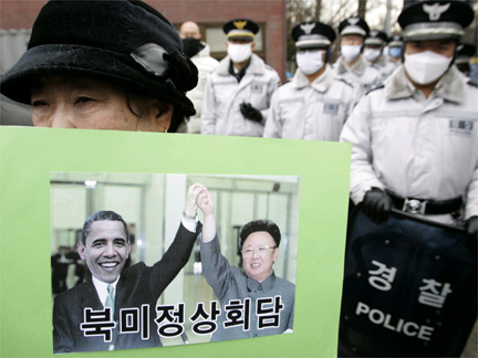 A South Korean peace activist at a rally Thursday near the presidential Blue House in Seoul (Photo: Reuters)