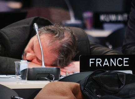 A French delegate sleeps during all-night discussions at Copenhagen
(Photo: Reuters)