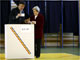 Casting ballots at a polling station in Bucharest, 6 December 2009(Photo: Radu Sigheti/Reuters)