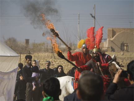 Actors re-enact the 7th century battle of Kerbala during the "Taziyeh" religious theatre performance on Tasoua, a day before Ashura, in Yazd, about 700 km south of Tehran, on Saturday. (Photo: Reuters)