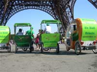 A velicab under the Eiffel tower(Photo: velicab via <a href="http://www.flickr.com/people/29254166@N06/" target="_blank">Flickr</a>)