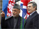 Gordon Brown and Hamid Karzai arrive at the Afghanistan conference in London(Photo: Reuters)