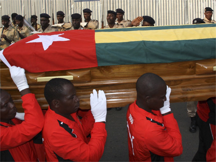 Pallbearers carry the coffin of Amalete Abalo, the assistant manager of Togo's football team, during his funeral in Lome on 15 January 2010(Photo: Reuters)