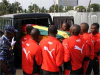 Pallbearers carry the coffin of assistant coach Amalete Abaldo at his funeral in Lome, 15 January 2010. Press officer Stan Ocloo was burried Saturday.(Photo: Reuters)