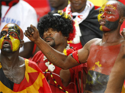 Angolan soccer fans react during their African Nations Cup soccer match against Algeria in Luanda on Monday
(Photo: Reuters)