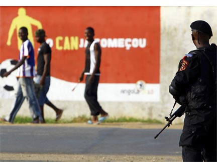 Angolan police special forces stand guard outside the Olympic Village, where teams taking part in the African Nations Cup soccer tournament are housed(Photo: Reuters)