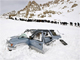 Rescuers head for the Salang tunnel as a car lies abandoned in the snow(Photo: Reuters)
