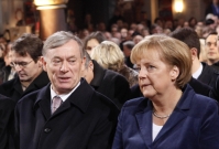 El presidente alemán, Hort Koehler, y la canciller alemana, Angela Merkel, en la iglesia Gethsemane de Berlín, el 9 de noviembre de 2009.Foto: Reuters