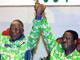 Alphonse Djédjé Mady (à droite) en campagne à Korhogo et à Bouaké pour le PDCI d'Henri Konan Bédié (à gauche). (Photo prise à Abidjan en 2002). 

		