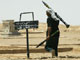 Un milicien de Moqtada al-Sadr près de la ville de Najaf. 

		(Photo : AFP)