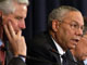 Michel Barnier et Colin Powell lors de la conférence de presse du G8. 

		(Photo : AFP)