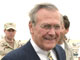 Donald Rumsfeld est venu à la rencontre des militaires chargés de la funeste prison d'Abou Ghraib.(Photo : AFP)