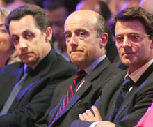 Nicolas Sarkozy, Alain Juppé et François Baroin. 

		(Photo AFP)