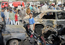 Des attaques à la voiture piégée ont tué au moins 23 personnes le 26 juin à Hilla, une ville située à une centaine de kilomètres au sud de Bagdad. 

		(Photo : AFP)