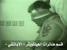 Photo extraite d'une vidéo diffusée par un site Internet islamiste montrant l'otage américain Paul Johnson. 

		(Photo: AFP)