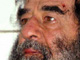 Saddam après son arrestation.AFP
