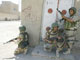 La Garde nationale irakienne prend position autour du mausolée d'Ali. 

		(Photo : AFP)