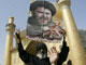 Les partisans du chef chiite Moqtada al-Sadr gardent les clés du mausolée d'Ali. 

		(Photo : AFP)