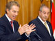 Tony Blair et  Iyad Allaoui ont appelé à l'unité internationale pour aider l'irak à retrouver le chemin de la démocratie. 

		(Photo : AFP)